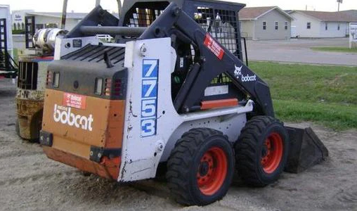 MANUAL DE PIEZAS DEL CARGADOR DE DIRECCIÓN DESLIZANTE BOBCAT 7753 509611001 - 509615999